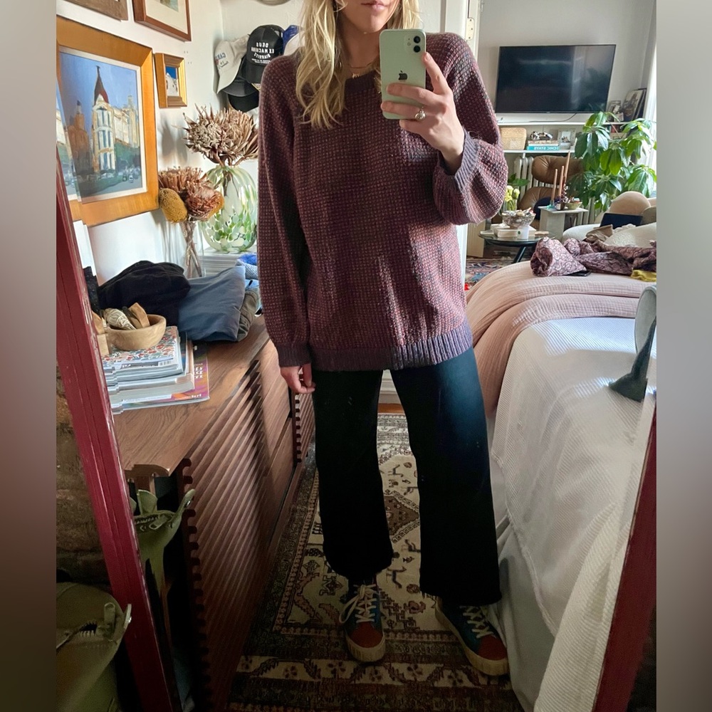 Sweater with open cut out at back